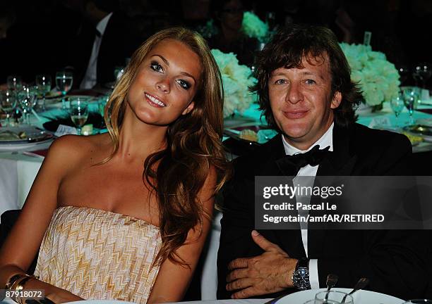 Ariane Brodier and guest attend the amfAR Cinema Against AIDS 2009 dinner at the Hotel du Cap during the 62nd Annual Cannes Film Festival on May 21,...