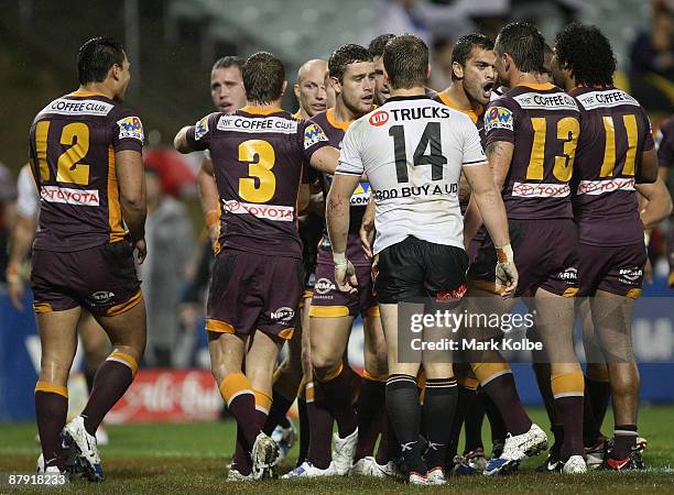 The Broncos celebrate after a try during the round 11 NRL match between the Wests Tigers and the Brisbane Broncos at Campbelltown Sports Stadium on...