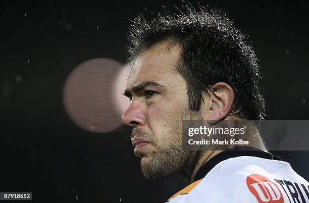 John Skandalis of the Tigers waits on the sideline to take the filed during the round 11 NRL match between the Wests Tigers and the Brisbane Broncos...