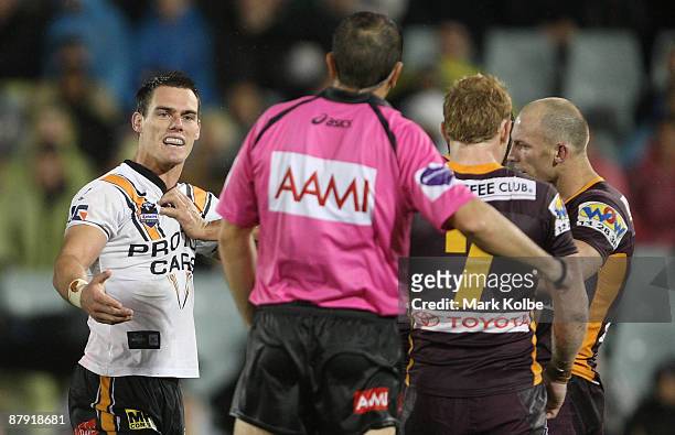 John Morris of the Tigers shows his frustration at the referee's decision during the round 11 NRL match between the Wests Tigers and the Brisbane...