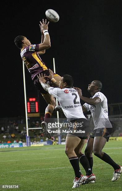 Israel Folau of the Broncos secures the high ball during the round 11 NRL match between the Wests Tigers and the Brisbane Broncos at Campbelltown...