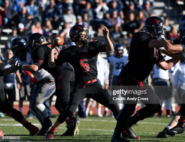 Eaglecrest QB Jalen Mergerson throws down field against Columbine in the fourth quarter during the state 5a semifinals at Legacy Stadium November 25,...