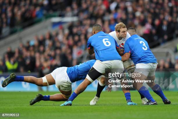 England's Joe Launchbury is tackled by Samoa's Piula Faasalele and Donald Brighouse during the 2017 Old Mutual Wealth Series Autumn International...