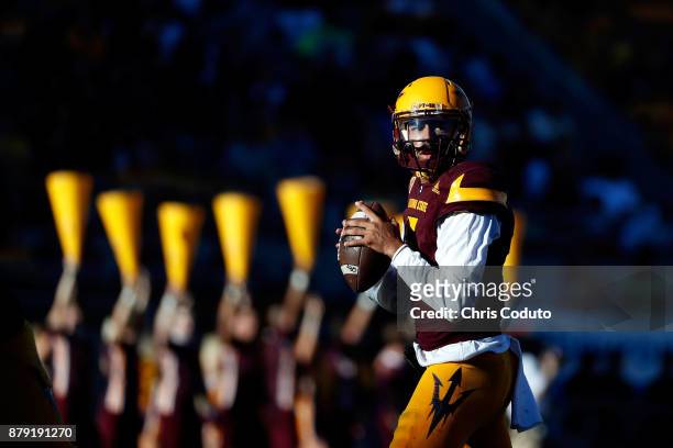 Quarterback Manny Wilkins of the Arizona State Sun Devils looks to pass during the first half of the college football game against the Arizona...