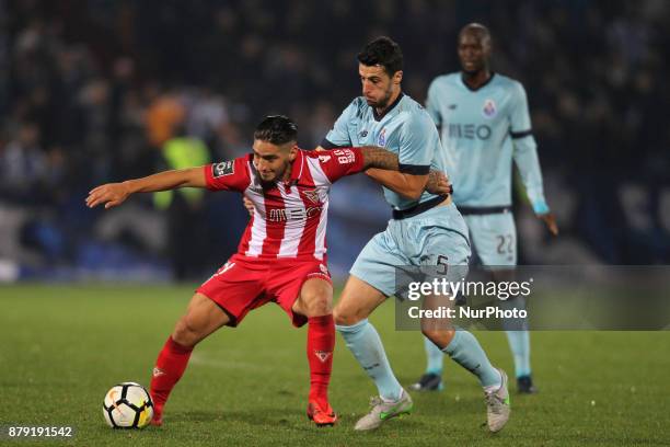 Aves´s Player forward C. Arago with Porto's Spanish defender Ivan Marcano during the Premier League 2017/18 match between CD Aves vs FC Porto at the...