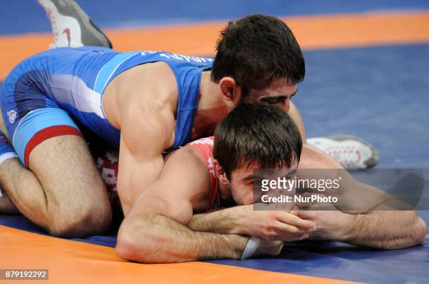 Belaruss Husain Shakhbanau competes with Russias Islam Dudaev during the Senior U23 Wrestling World Championships in the 61 kg class on November 25,...