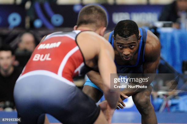 Cubas Reineri Andreu Ortega competes with Bulgarias Mikyay Naim during the Senior U23 Wrestling World Championships in the 57 kg class on November...