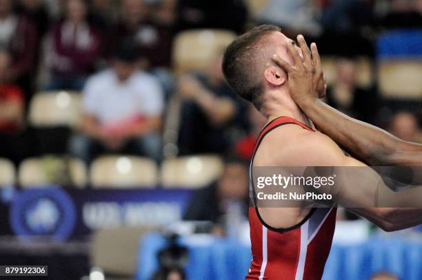 Cubas Reineri Andreu Ortega competes with Bulgarias Mikyay Naim during the Senior U23 Wrestling World Championships in the 57 kg class on November...