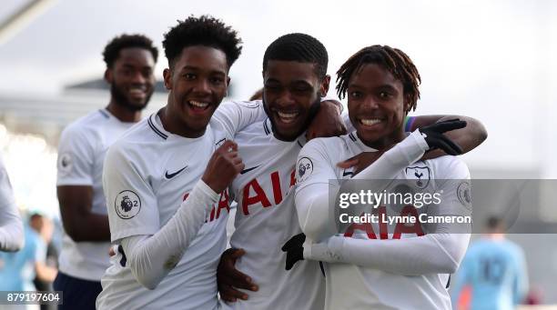 Kazaiah Sterling of Tottenham Hotspur celebrates with Japher Tanganga and Jadon Brown during the Premier League 2 at The Academy Stadium on November...