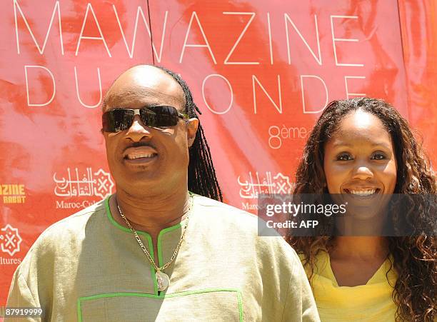 Singer Stevie Wonder poses with his daughter Aicha during a photo-call at Rabat on May 22, 2009 at the eighth Mawazine music festival . AFP...