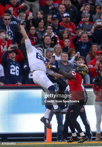 Maryland Terrapins defensive back Darnell Savage Jr. Watches as Penn State Nittany Lions tight end Mike Gesicki leaps up for an overthrown pass...