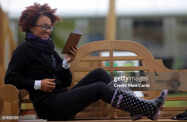 Festival-goer uses the Reader from Sony during the Guardian Hay Festival on May 22 2009 in Hay-on-Wye, England. Sony, a new sponsor of the Guardian...