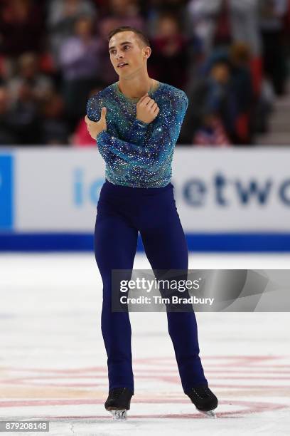 Adam Rippon of the United States cradles his arm after competing in the Men's Free Skating during day two of 2017 Bridgestone Skate America at Herb...