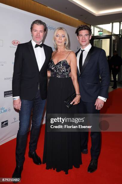 John Juergens, Philipp Danne and Kirsten Kuhnert attend the charity event Dolphin's Night at InterContinental Hotel on November 25, 2017 in...