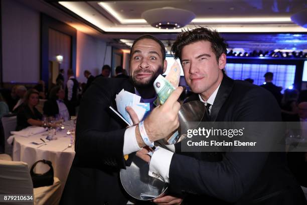 Mike Adler and Philipp Danne attend the charity event Dolphin's Night at InterContinental Hotel on November 25, 2017 in Duesseldorf, Germany.