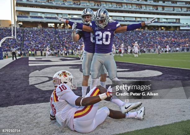 Strong safety Denzel Goolsby of the Kansas State Wildcats reacts after braking up a pass in the end zone against wide receiver Marchie Murdock of the...