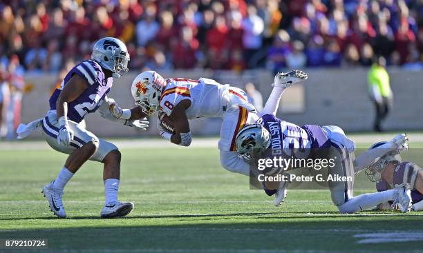 Strong safety Denzel Goolsby of the Kansas State Wildcats tackles wide receiver Deshaunte Jones of the Iowa State Cyclones during the first half on...
