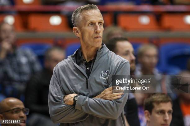 Head coach Mike Dunlap of the Loyola Marymount Lions looks down the court during first half action against the Boise State Broncos on November 25,...