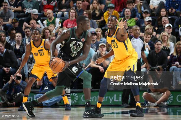 Ekpe Udoh of the Utah Jazz blocks the shot against Thon Maker of the Milwaukee Bucks on November 25, 2017 at vivint.SmartHome Arena in Salt Lake...
