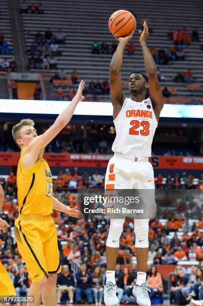 Frank Howard of the Syracuse Orange shoots the ball over Jaelan Sanford of the Toledo Rockets during the second half at the Carrier Dome on November...