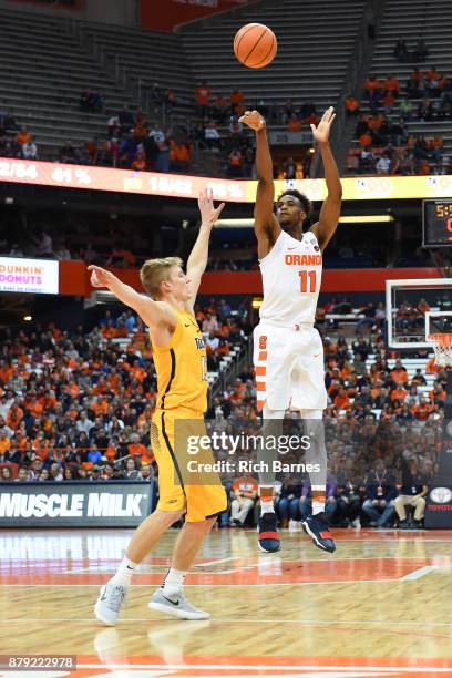 Oshae Brissett of the Syracuse Orange shoots the ball over Jaelan Sanford of the Toledo Rockets during the second half at the Carrier Dome on...