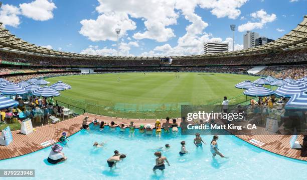 Fans enjoy the pool deck during day four of the First Test Match of the 2017/18 Ashes Series between Australia and England at The Gabba on November...