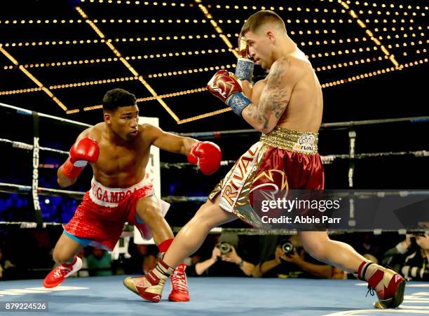 Jason Sosa and Yuriorkis Gamoba fight during their Junior Lightweights at The Theater at Madison Square Garden on November 25, 2017 in New York City.