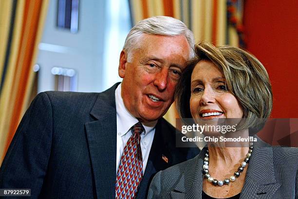 Speaker of the House Nancy Pelosi talks with Majority Leader Steny Hoyer during her weekly news conference at the U.S. Capitol May 22, 2009 in...