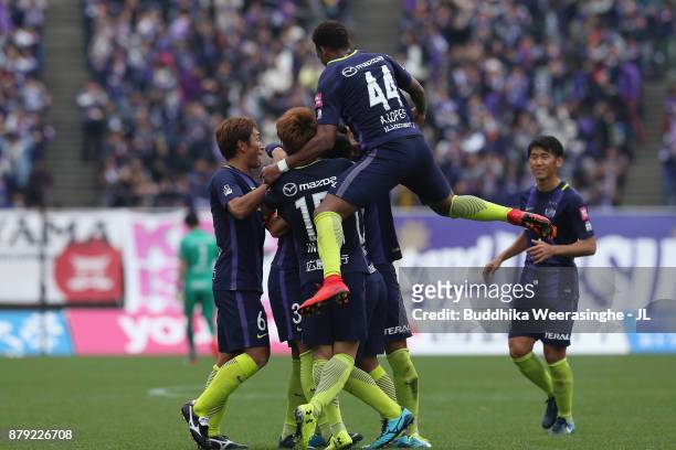 Sanfrecce Hiroshima players celebrate their first goal scored by Kosei Shibasaki during the J.League J1 match between Sanfrecce Hiroshima and FC...