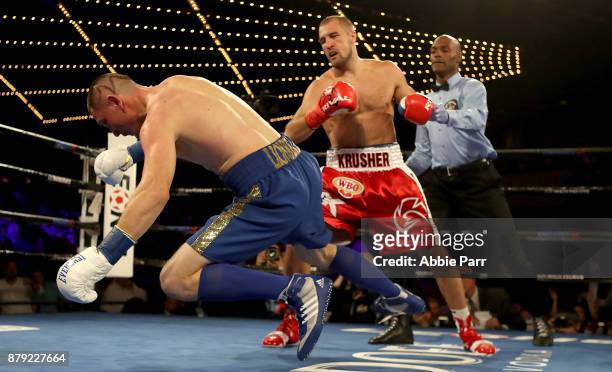Vyacheslav Shabranskyyis knocked down by Sergey Kovalev during their Light Heavyweight at The Theater at Madison Square Garden on November 25, 2017...