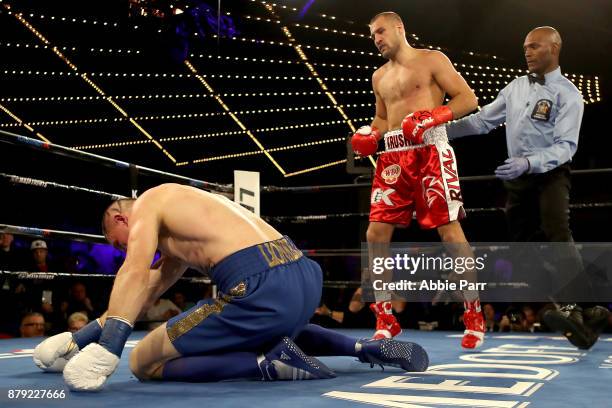 Vyacheslav Shabranskyyis knocked down by Sergey Kovalev during their Light Heavyweight at The Theater at Madison Square Garden on November 25, 2017...