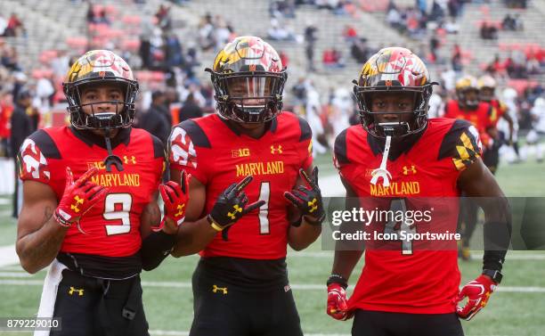 Maryland Terrapins wide receiver Jahrvis Davenport , wide receiver D.J. Moore , and defensive back Darnell Savage Jr. Posing for the camera before a...