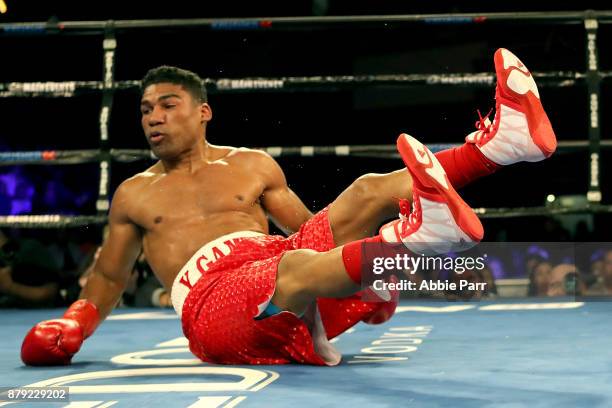 Jason Sosa is knocked down by Yuriorkis Gamoba fight during their Junior Lightweights at The Theater at Madison Square Garden on November 25, 2017 in...