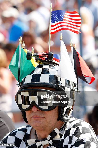 Race fan watches the action during Miller Lite Carb Day practice for the IRL IndyCar Series 93rd running of the Indianapolis 500 on May 22, 2009 at...