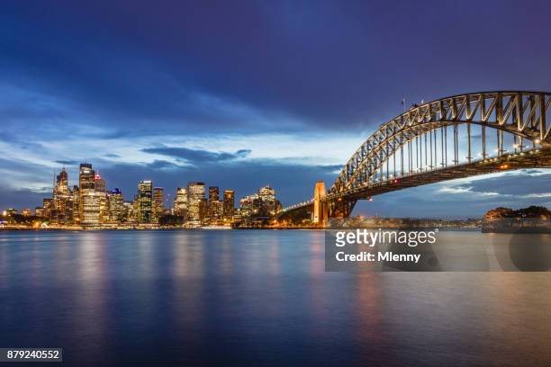 australia sydney skyline with sydney harbour bridge at twilight - darling harbor stock pictures, royalty-free photos & images