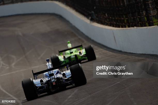 Mike Conway drives the Dreyer & Reinbold Racing Dallara Honda behind Nelson Philippe in the i drive green HVM Racing Dallara Honda during Miller Lite...