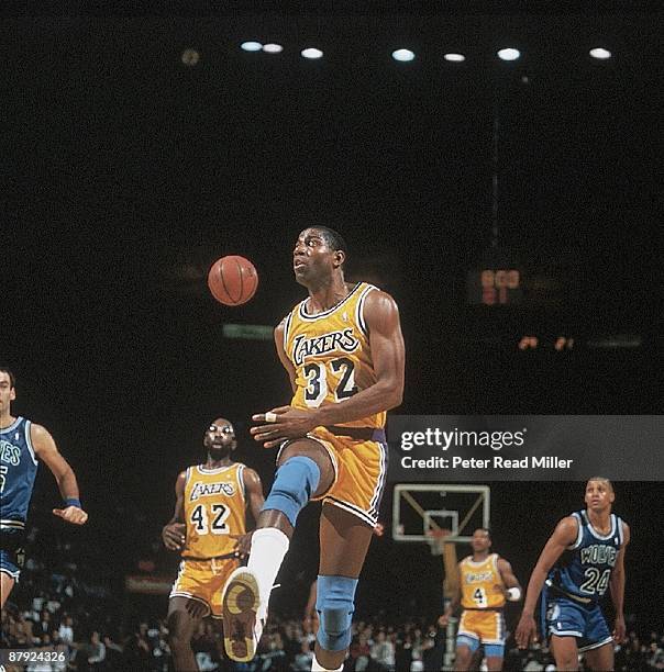 Los Angeles Lakers Magic Johnson in action, making no-look pass vs Minnesota Timberwolves. Inglewood, CA 2/13/1991 CREDIT: Peter Read Miller