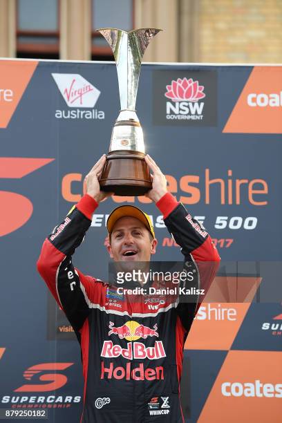 Jamie Whincup driver of the Red Bull Holden Racing Team Holden Commodore VF celebrates after winning race 26 and the 2017 Supercars Drivers...