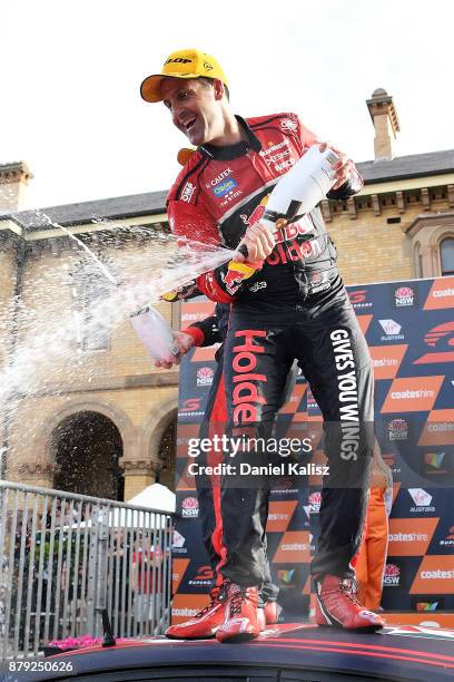 Jamie Whincup driver of the Red Bull Holden Racing Team Holden Commodore VF celebrates after winning race 26 and the 2017 Supercars Drivers...