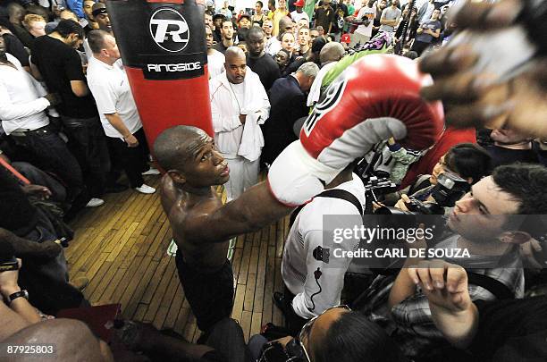 Boxer Floyd Mayweather greets fans during a promotional training session and media opportunity at the Peacock boxing gym, Canning Town, in London on...