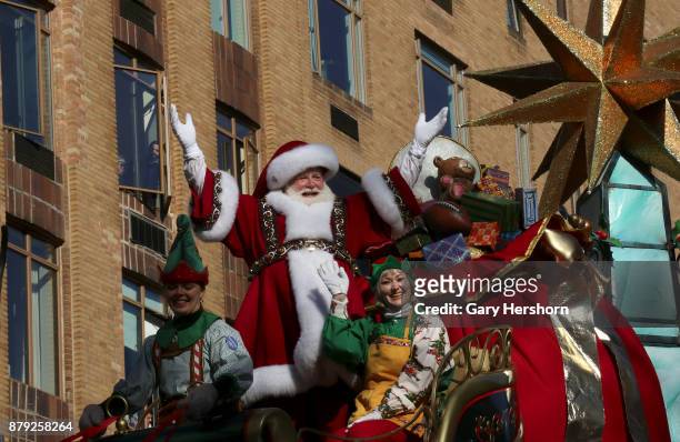 Santa Claus waves at the end of the annual Thanksgiving Day Parade on November 23, 2017 in New York City. The Macy's Thanksgiving Day parade is the...
