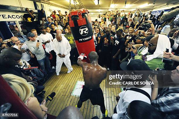 Boxer Floyd Mayweather spars during a promotional training session and media opportunity at the Peacock boxing gym, Canning Town, in London on May...