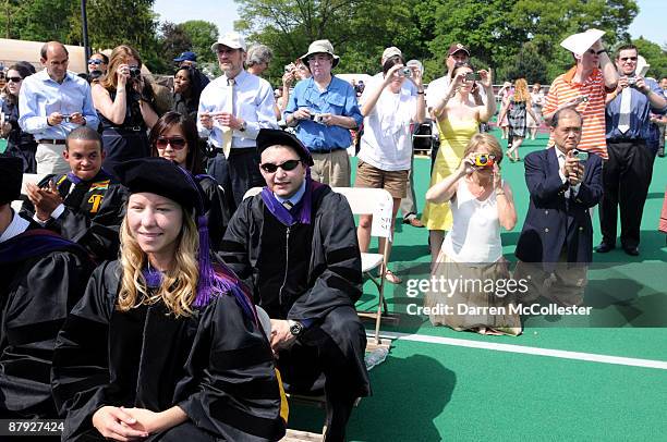 Family members take photos of graduating students during Boston College's Law School graduation ceremonies May 22, 2009 at Boston College's Newton...
