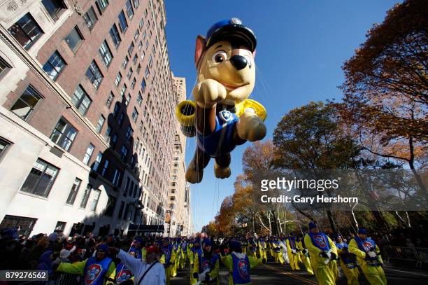 The Chase balloon floats down Central Park West during the annual Thanksgiving Day Parade on November 23, 2017 in New York City.