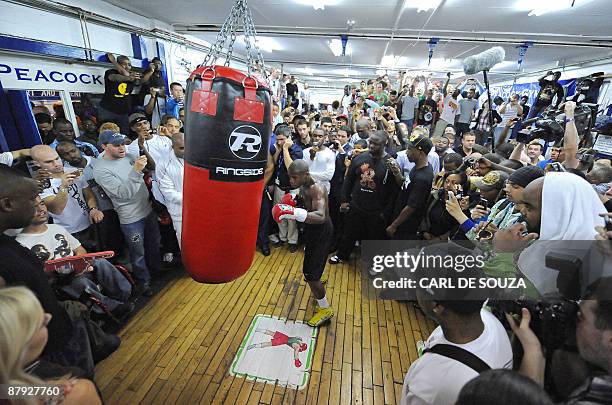 Boxer Floyd Mayweather is pictured during a promotional training session and media opportunity at the Peacock boxing gym, Canning Town, in London on...