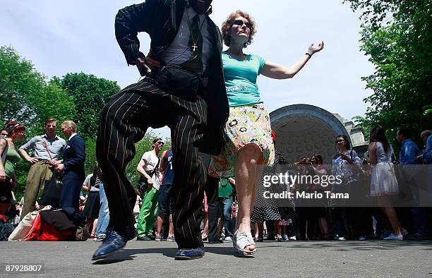Celebrants swing dance in Central Park to honor legendary Lindy Hop dancer Frankie Manning May 22, 2009 in New York City. Lindy Hop is an acrobatic...
