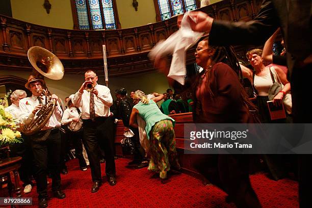 Celebrants dance during a church service honoring legendary Lindy Hop dancer Frankie Manning May 22, 2009 in New York City. Lindy Hop is an acrobatic...