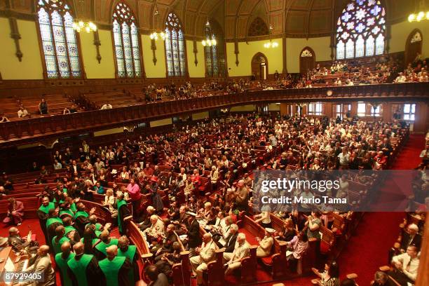 Celebrants look on during a church service honoring legendary Lindy Hop dancer Frankie Manning May 22, 2009 in New York City. Lindy Hop is an...
