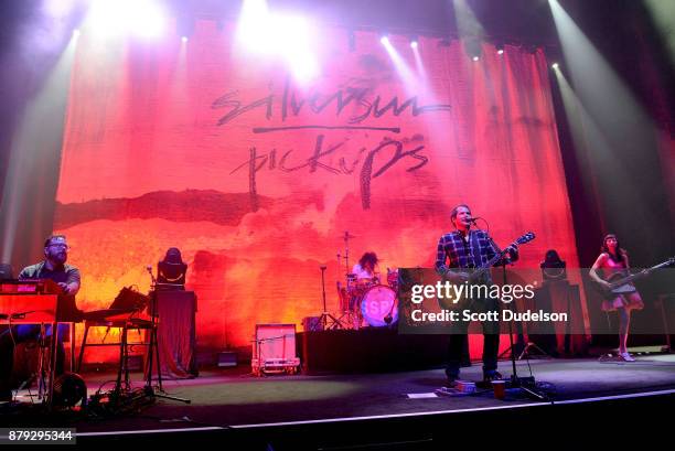 Musicians Joe Lester, Chris Guanlao, Brian Aubert and Nikki Monninger of the band Silversun Pickups perform onstage during a benefit concert in...