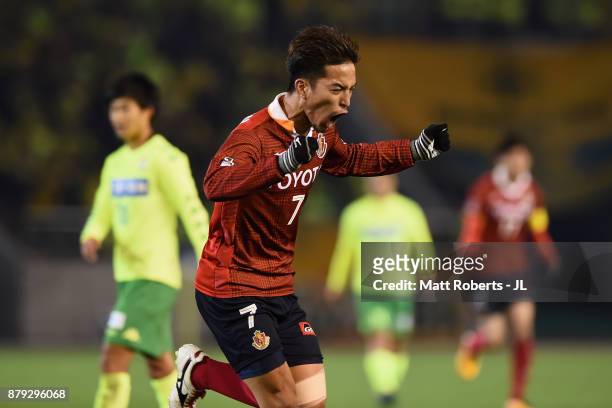 Taishi Taguchi of Nagoya Grampus celebrates scoring his side's first goal to make it 1-1 during the J.League J1 Promotion Play-Off semi final match...